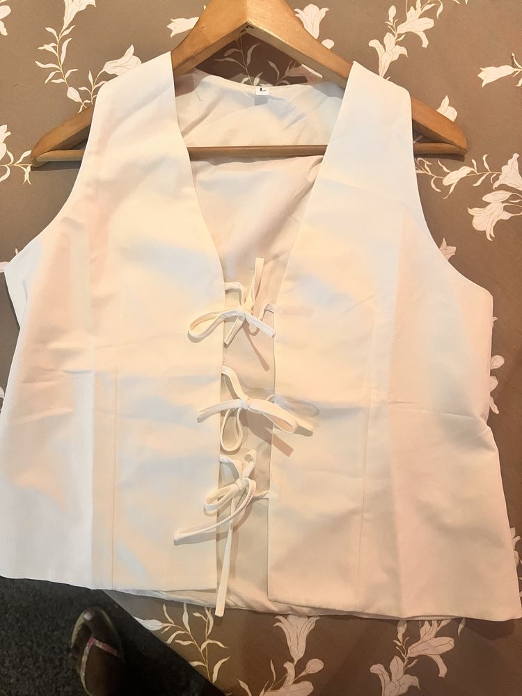 Top/colete creme Tamanho M