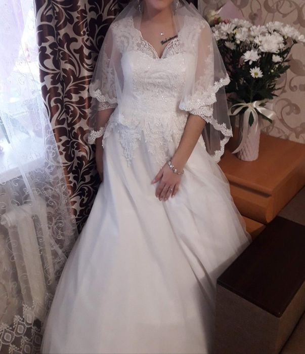 Весільна сукня,дуже гарна