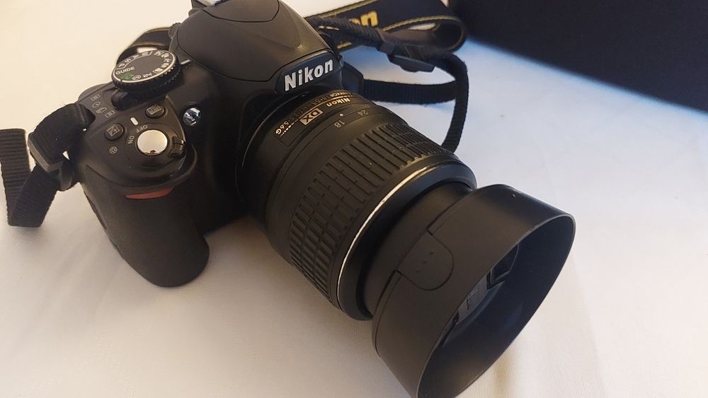 Nikon D3100 + objectiva + mala lowepro