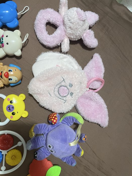 Іграшки для новонароджених. Гризунці. Брязкальця. Кліпса для соски.