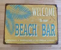 Placa de chapa “WELCOME TO OUR BEACH BAR” imita o antigo há