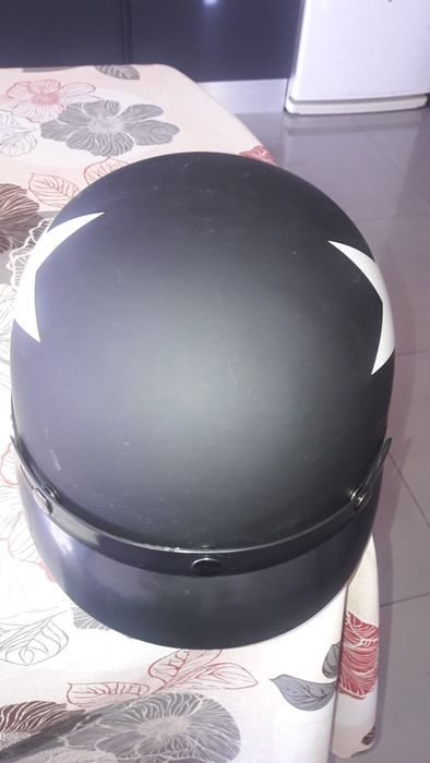 Capecete como novo.
