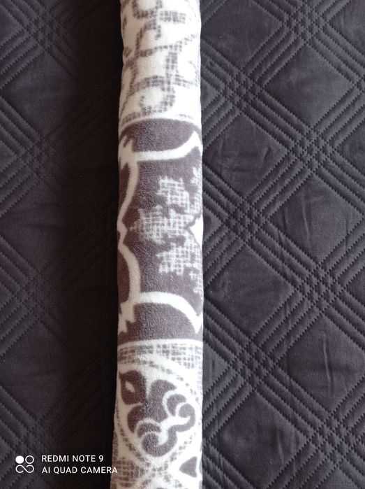 Ochraniacz do łóżeczka w formie mięciutkiego wałka