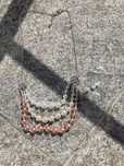 Conjunto colar e brincos.