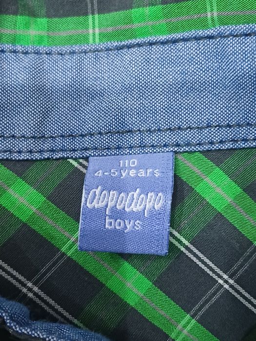 Dwie koszule w kratę dla bliźniaków jedna niebieska, druga zielona