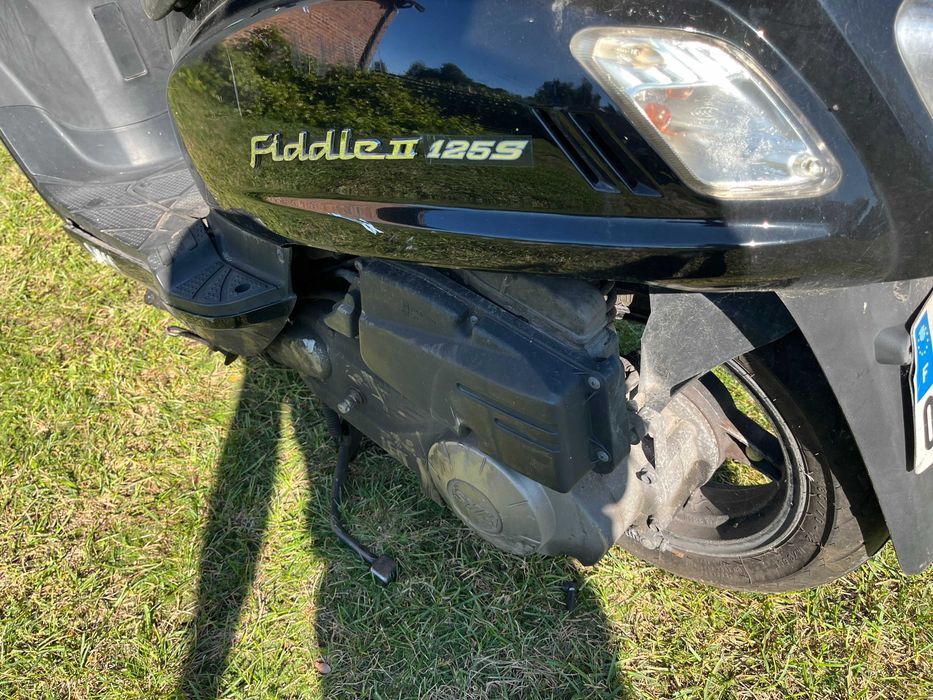 Sym Fiddle II 125 na części lagi czasza osłony gaźnik silnik błotnik