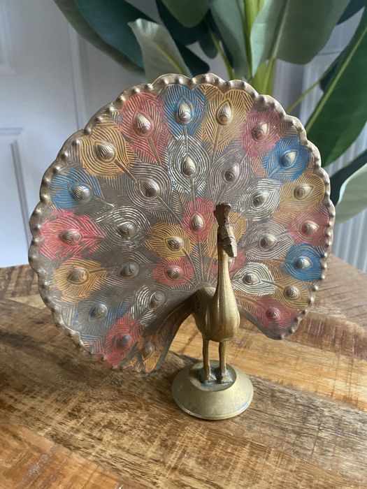 Kolorowy paw z mosiądzu vintage