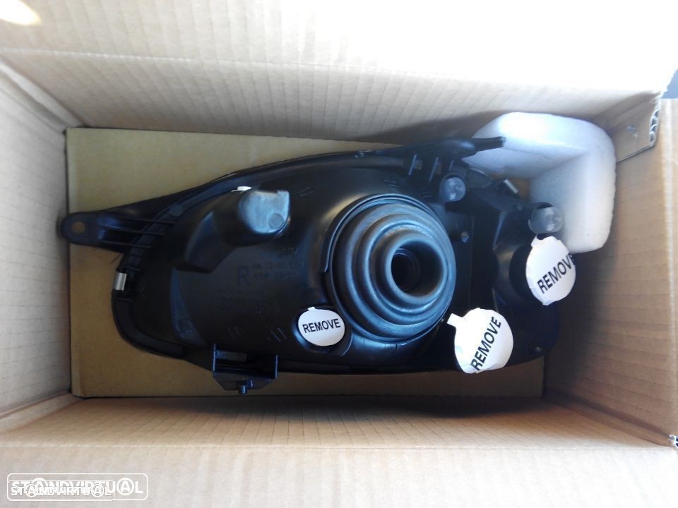 Farol Opel Corsa B modelo:  novo (vidro liso)