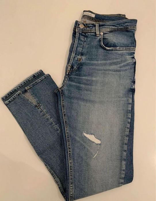 Calças de ganga com abertura