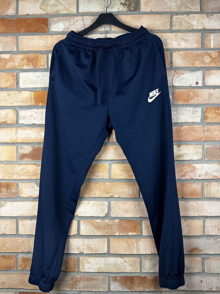 Синие штаны Nike