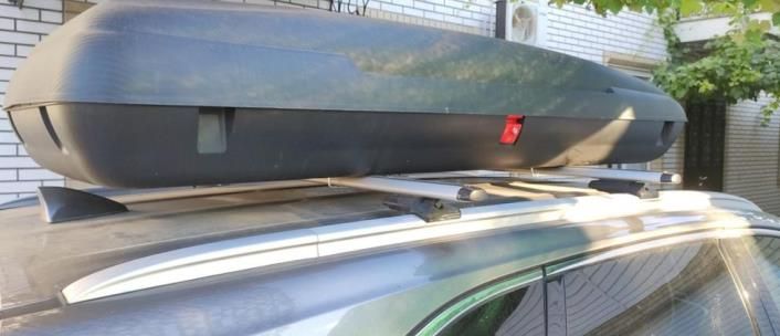 Аэродинамические поперечины на KIA Sportage для боксов