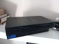 PS2 fat com algumas marcas de uso