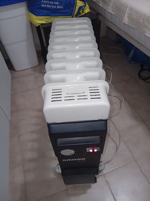 Aquecedor a óleo de 8 eleme , afuncionar muito bem.