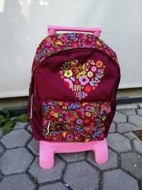 Conjunto de mochila e mala cor de rosa da "Busquets"