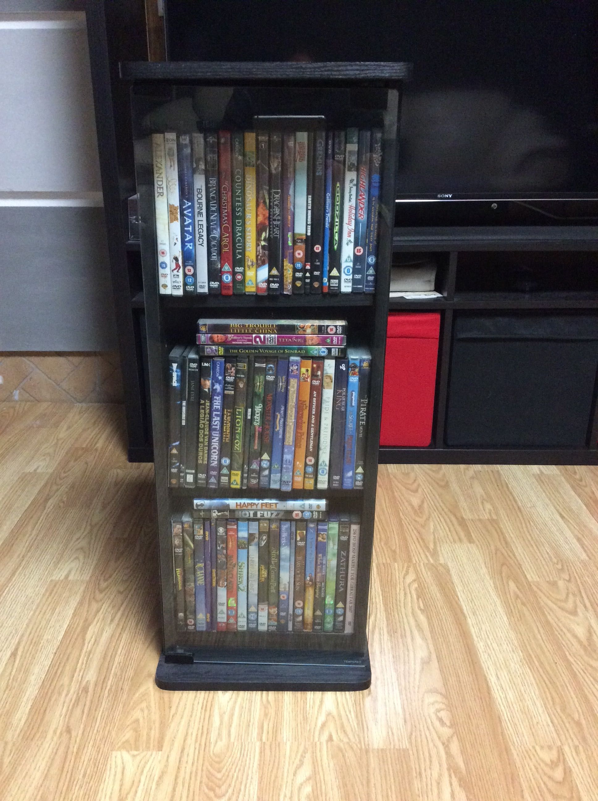 Armário de armazenamento de DVD com porta de vidro