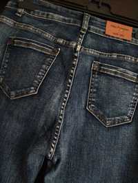 Spodnie jeansowe rurki cyrkonie wysoki stan