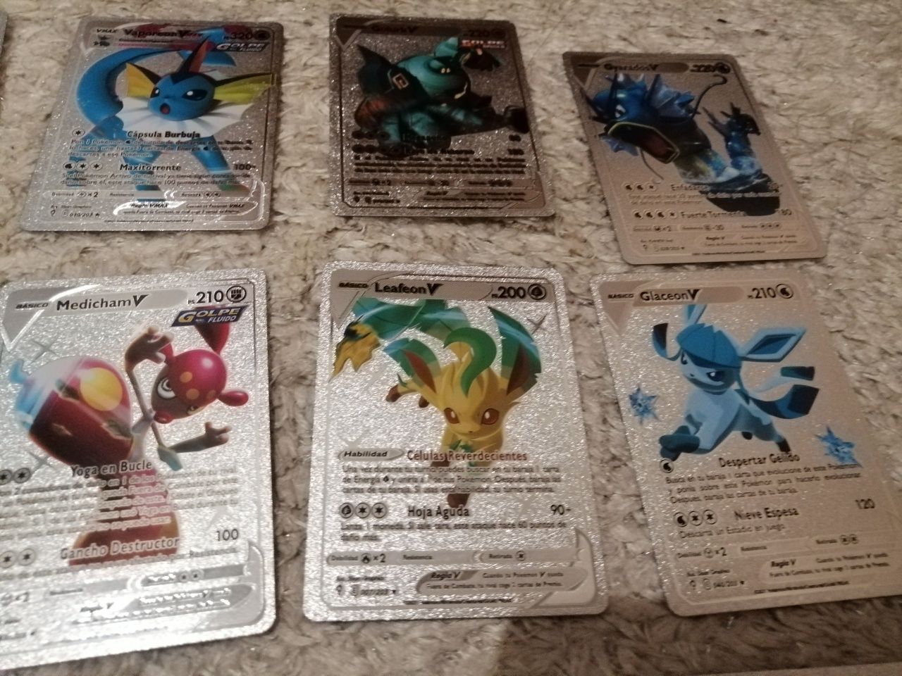 Cartas Pokémon douradas/prateadas