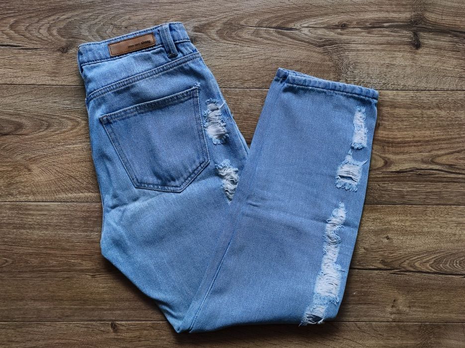 Spodnie jeansowe z dziurami 36