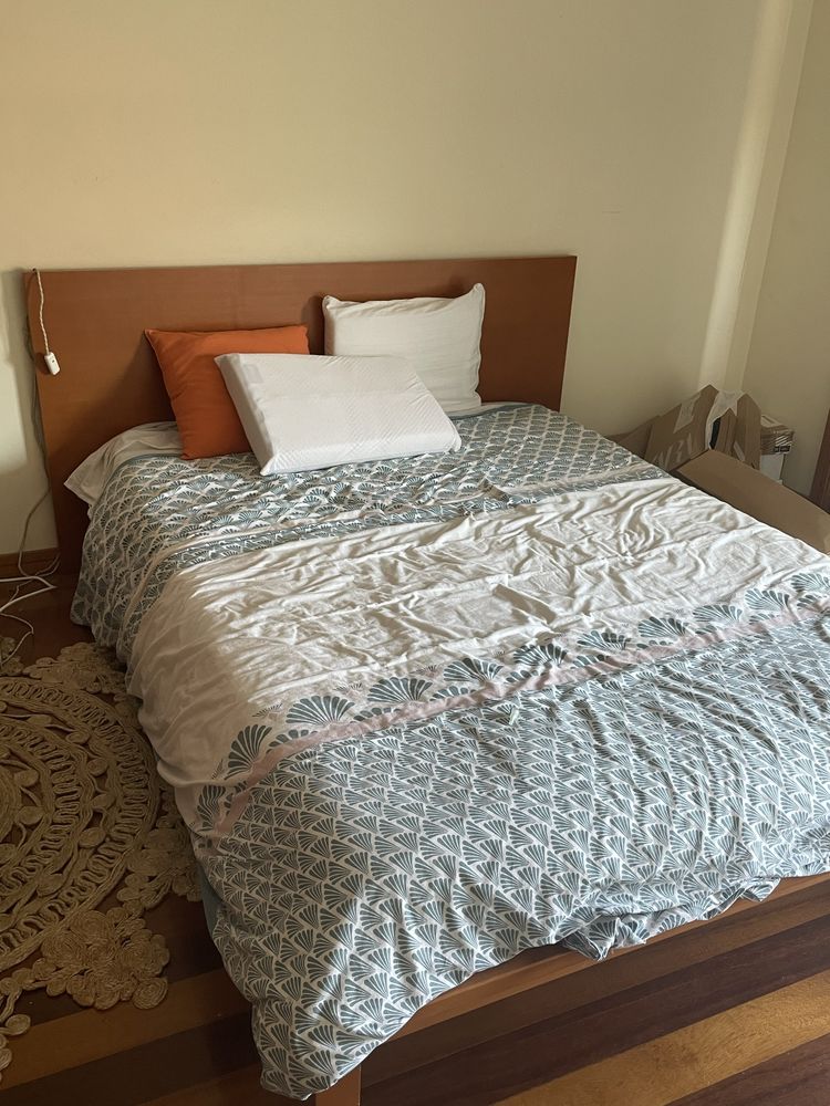 Cama de casal e colchāo