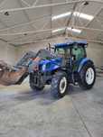 Ciągnik New Holland TS 100 A z ładowaczem MX