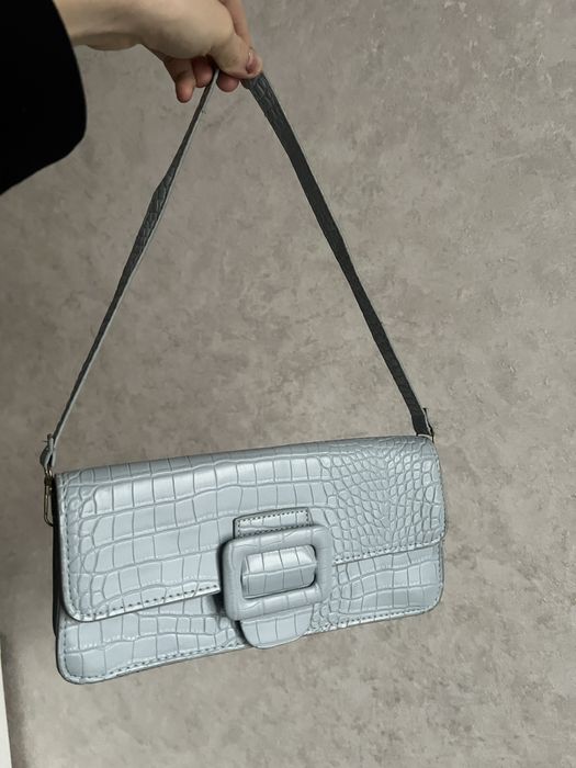 Сумка-клатч голубого кольору