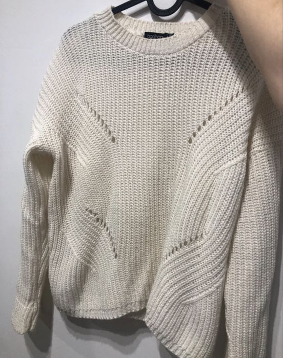 Kremowy  sweter damski