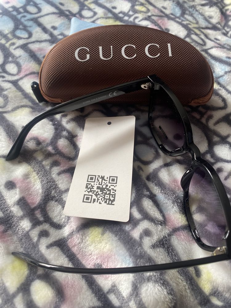 Okulary przeciwsłobeczne Gucci z filtrem 400, z etui