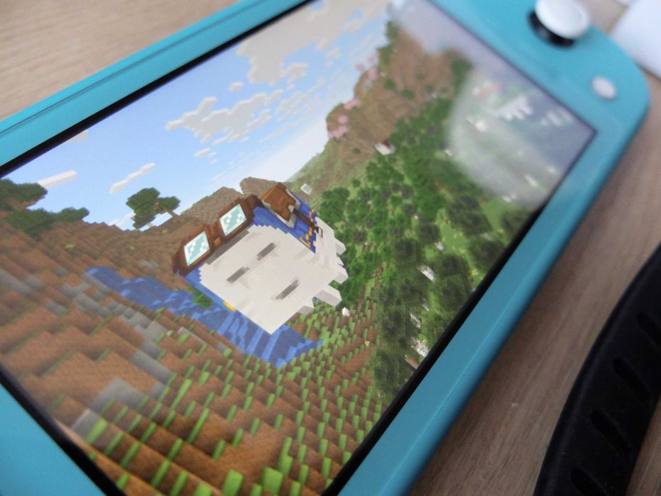 Nintendo Switch Lite, completa + mala de transporte Nintendo.