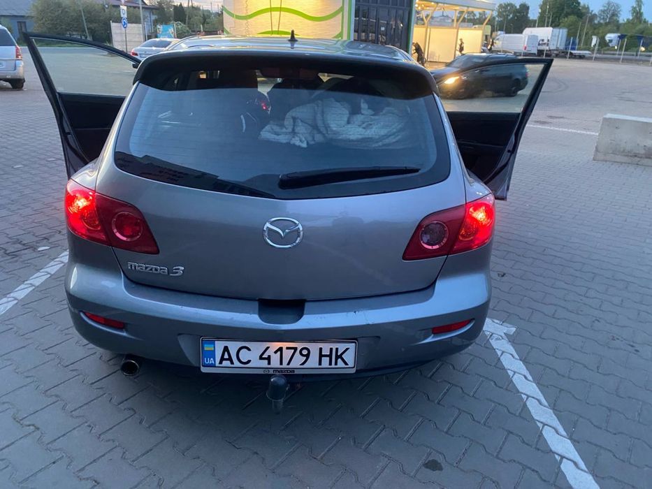 Мазда 3 . Хатчбек . 2005 рік 1.6 безин