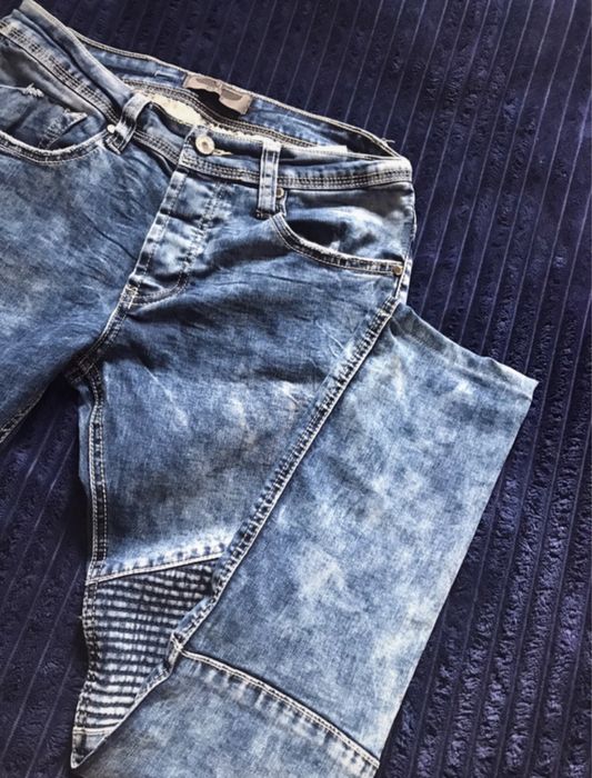 Niebieskie spodnie dżinsowe 29 na wiele guzików Denim