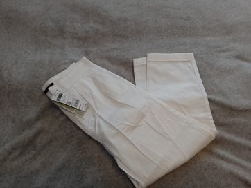 Nowe białe spodnie Sisley dla dziewczynki