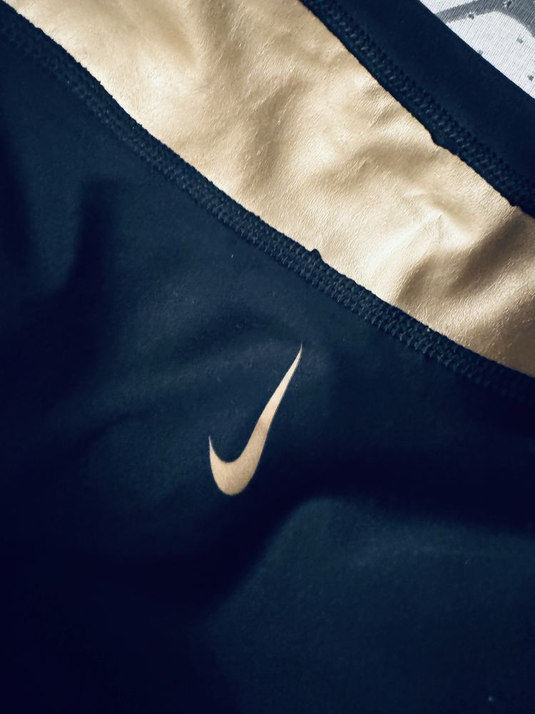 Spodnie sportowe Nike XL Dri-fit czarno zlote super stan