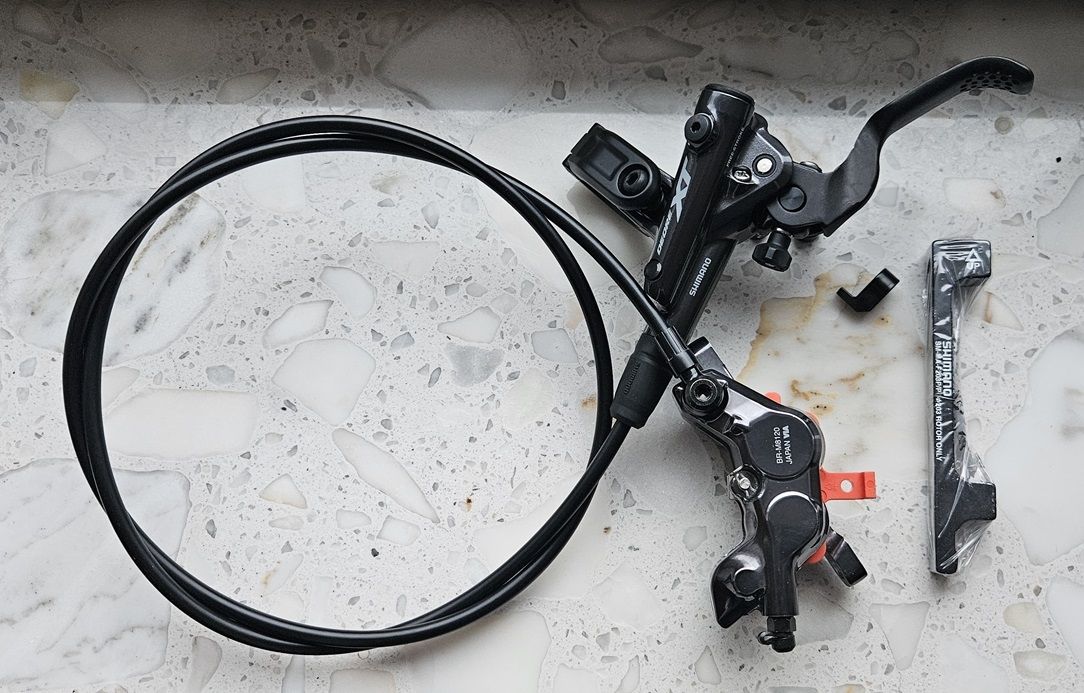 Hamulec tarczowy hydrauliczny Shimano Deore XT M8120 przód OEM