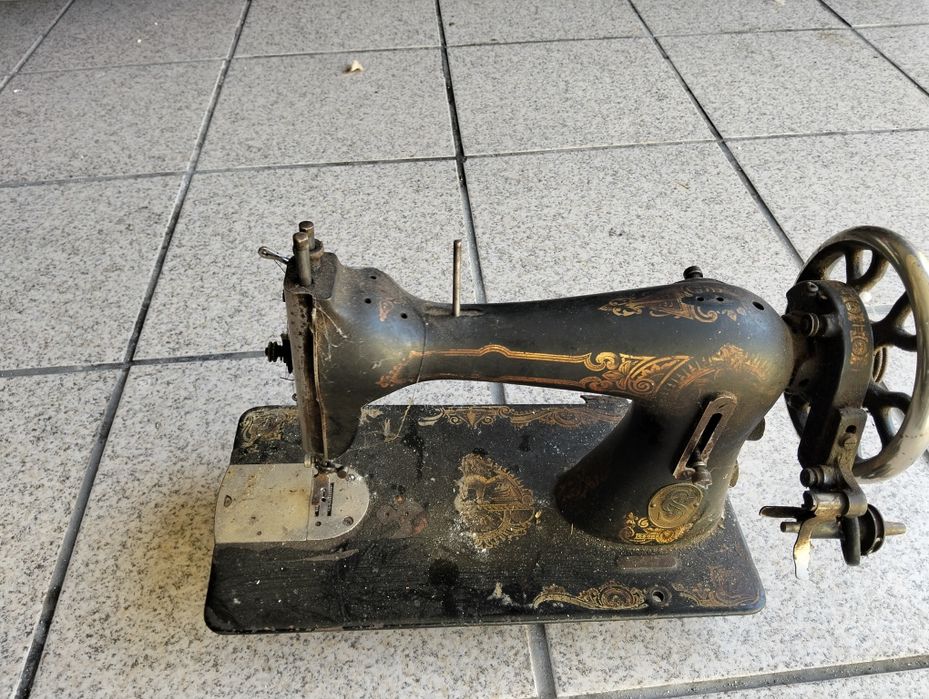 Cabeça de máquina de costura