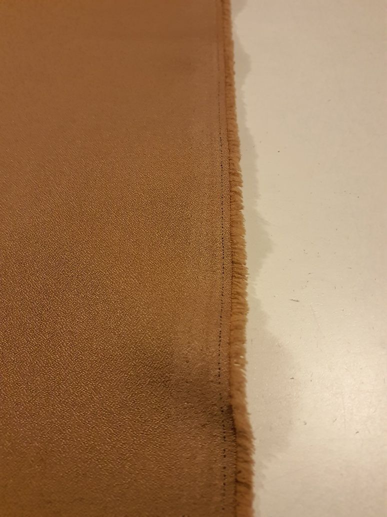 Tkanina ciemny beż szer.150 cm.