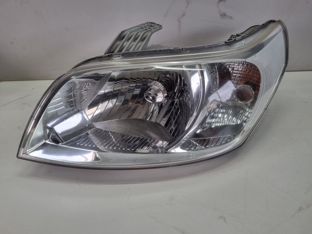 chevrolet aveo T250 lampa przednia lewa lewy przód europa