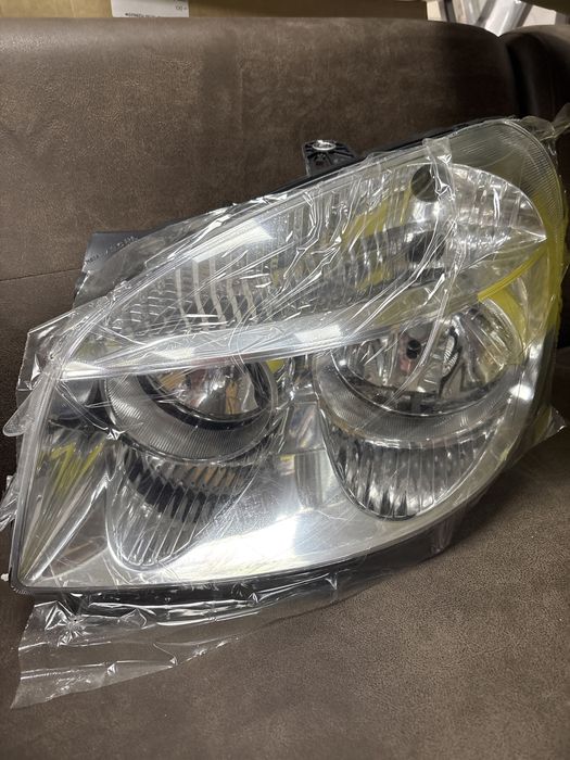 Фара ліва Fiat Doblo 05-10