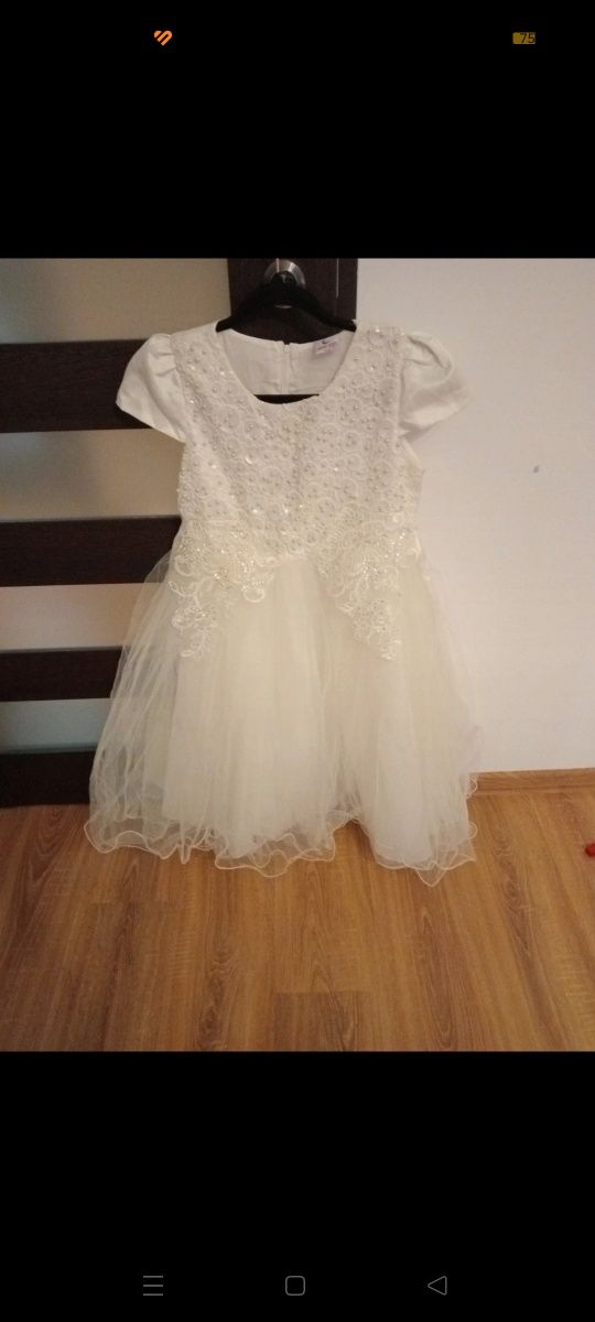 Śliczna biała sukienka 158/164