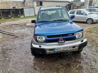 Mitsubishi pajero pinin 1.8 gdi silnik skrzynia most reduktor części