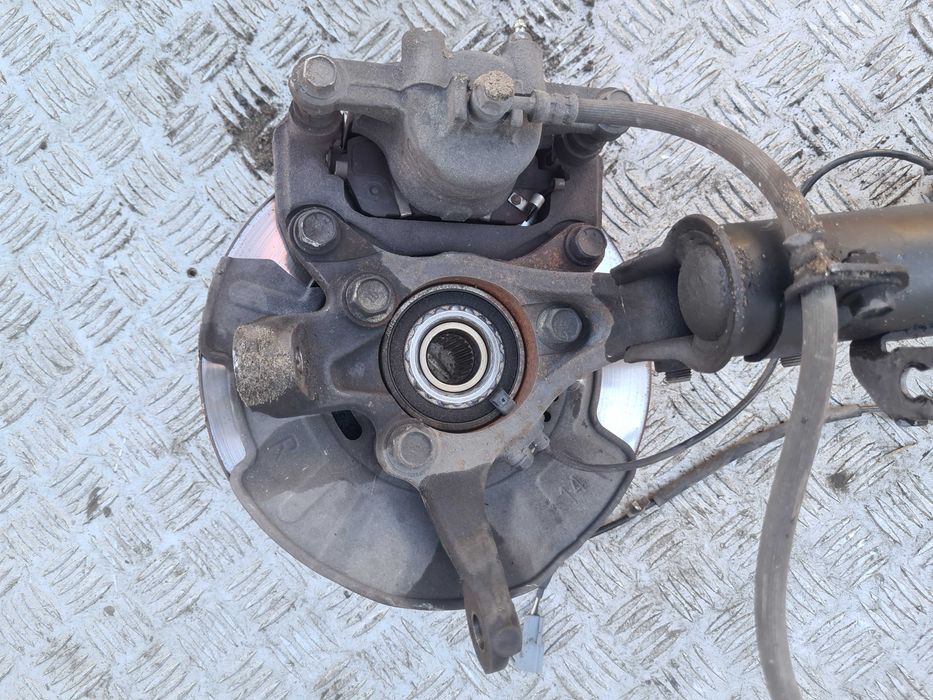 Suzuki Swift VI MK8 1.2 mcpherson zwrotnica amortyzator przód prawy