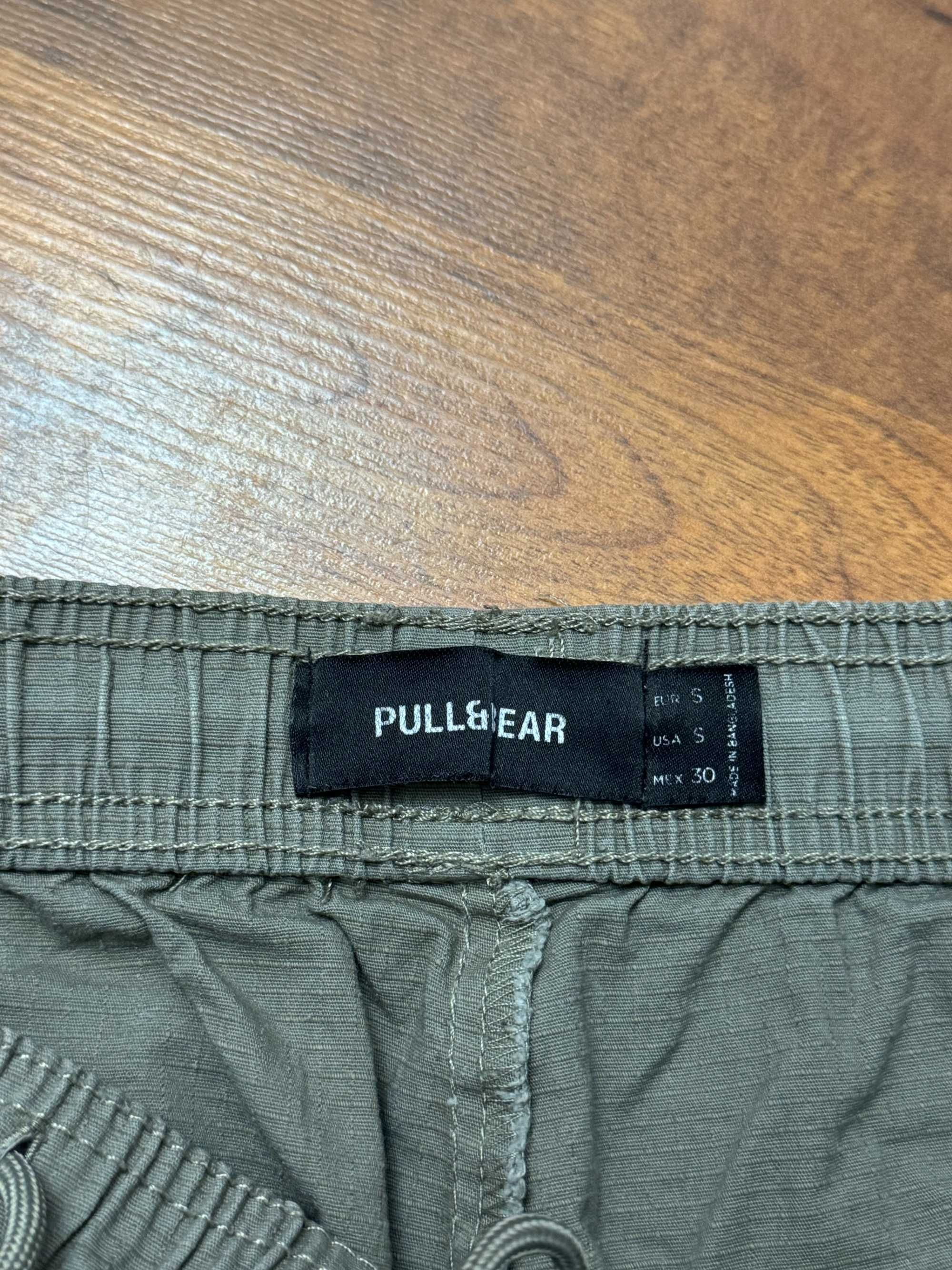 Spodnie materiałowe szare khaki na gumce cargo bojówki Pull Bear S