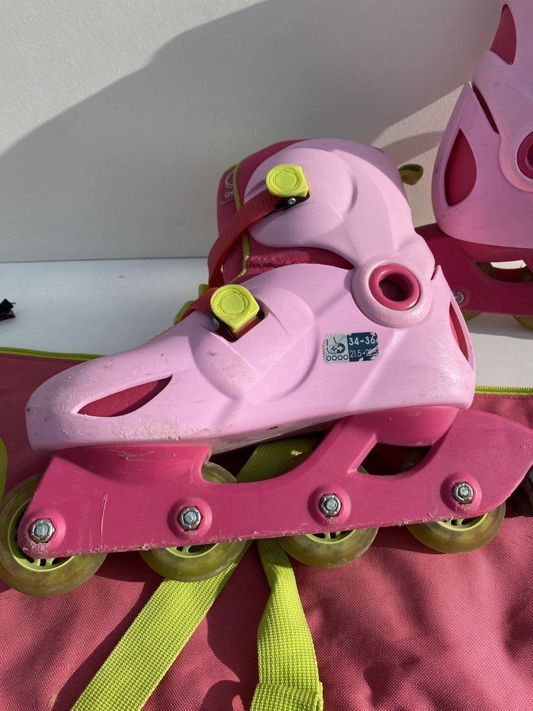 Patins em linha rosa