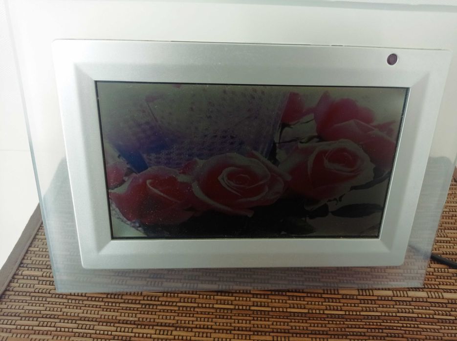 Moldura digital com manuais