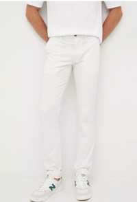 Tommy Hilfiger rozmiar L białe bawełniane spodnie męskie