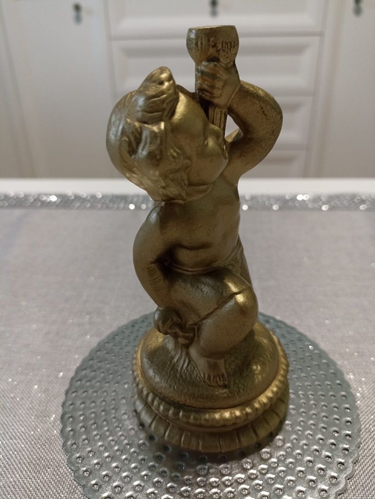 Figurka chłopca metalowa