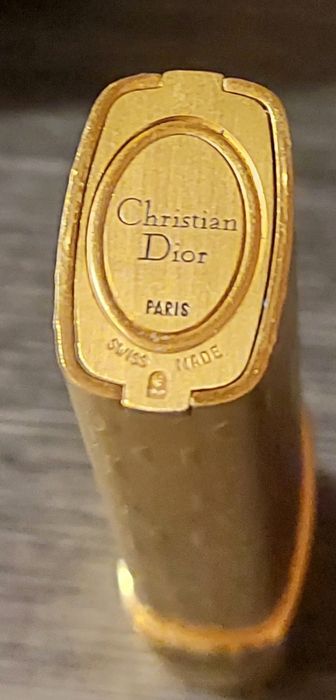 Isqueiro Cristian Dior Novo.