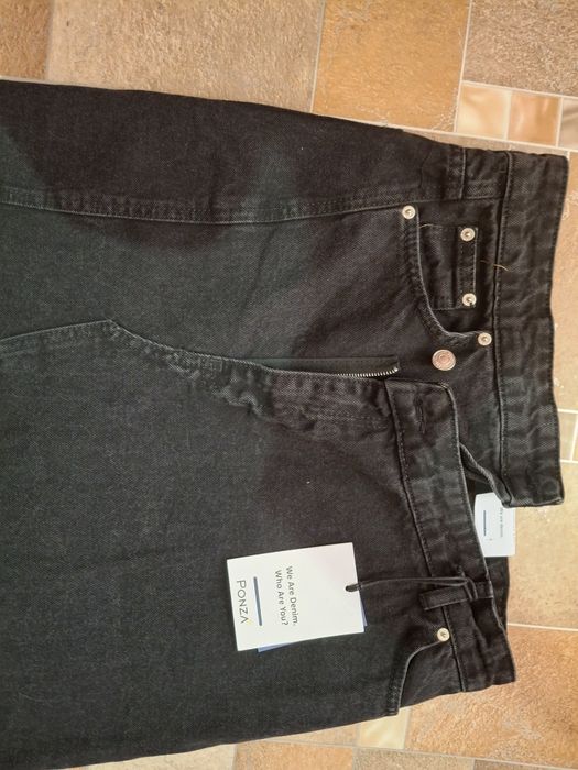 Джинсова спідниця з оригінальним дизайном