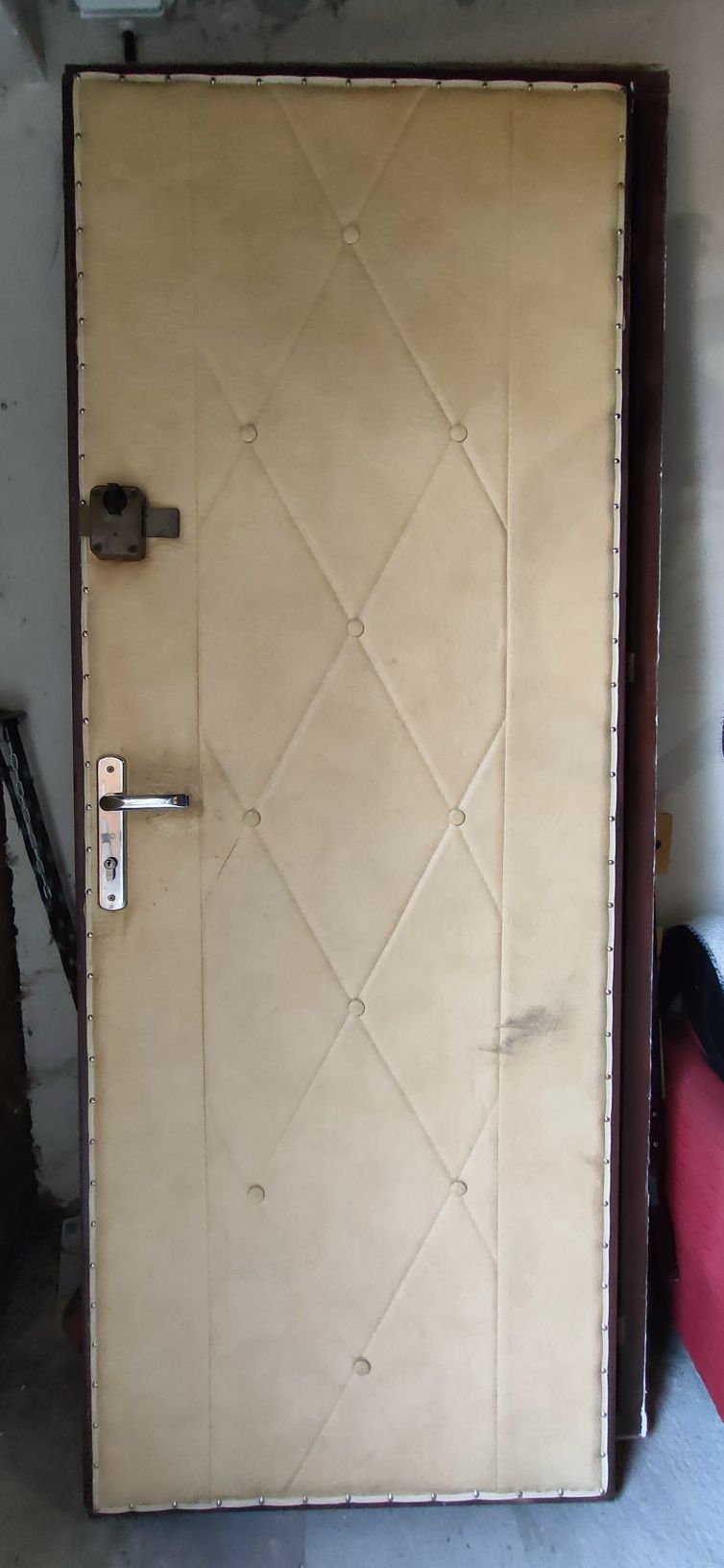 Drzwi drewniane dębowe otapicerowane