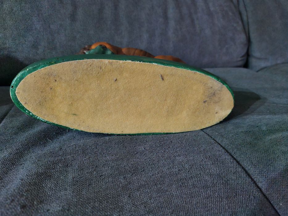 Leão antigo em cerâmica