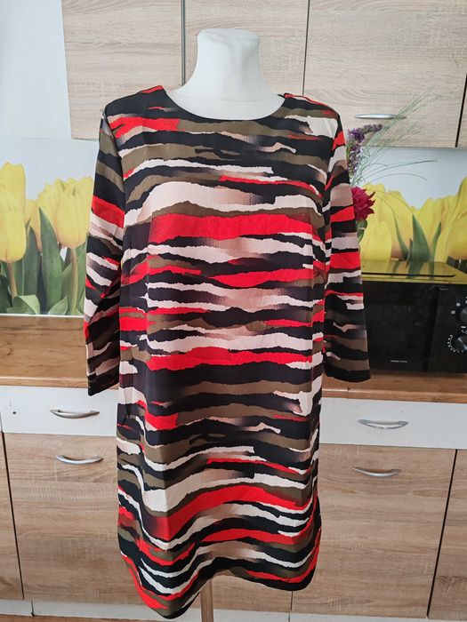 Śliczna koktajlowa mini sukienka H&M rozmiar 44 poliester/elastan